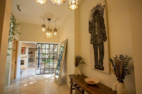 Jacaranda House